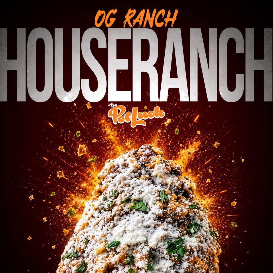 A mound of food, possibly a casserole, with melted cheese and green herbs, exploding with fiery sparks.